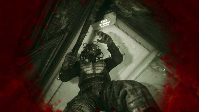 An enemy towers over a player in The Outlast Trials.